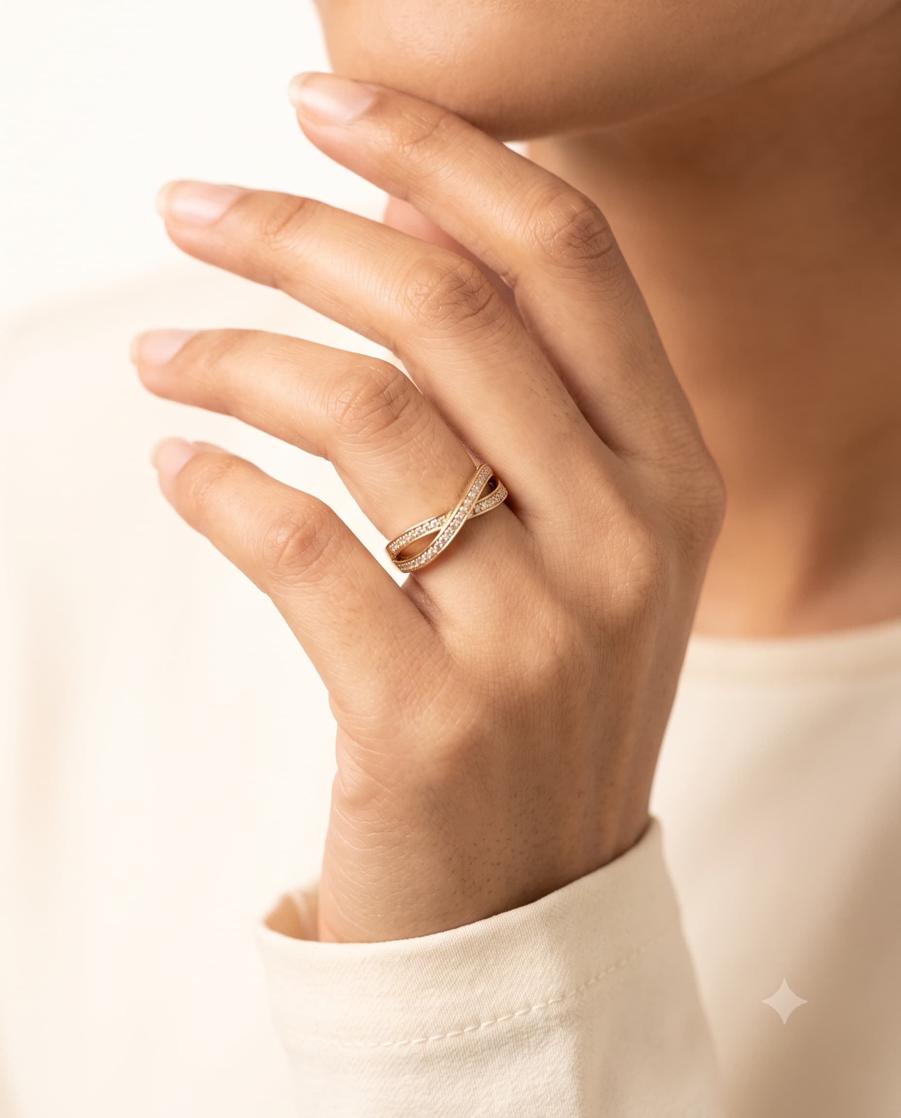 Model wearing a crossover stone ring
